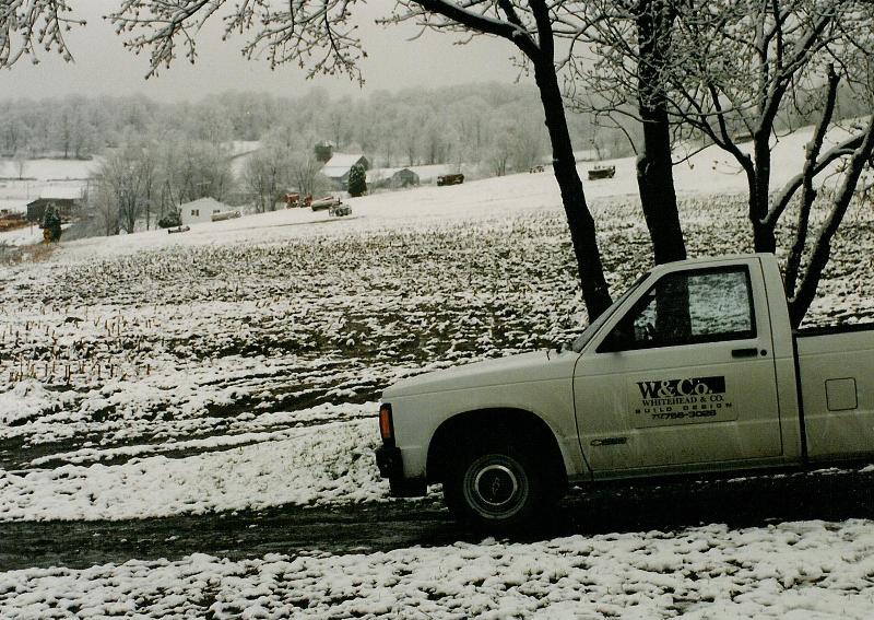 The company truck in the driveway.