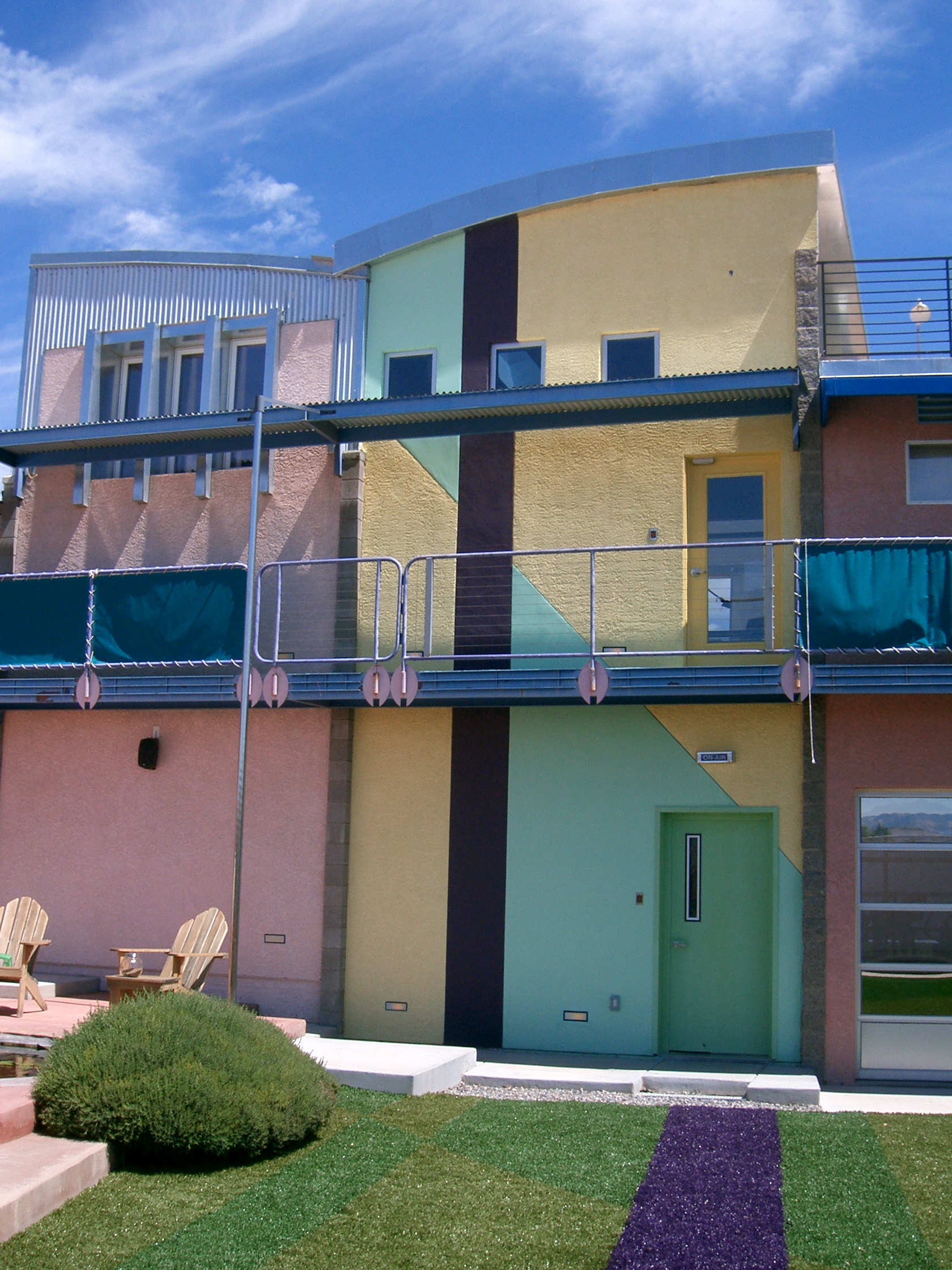 The east facade of the studio, with the artificial grass in place. The diagram o