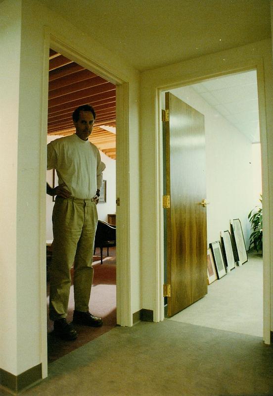 Looking into the office from the common space, the difference between our space 