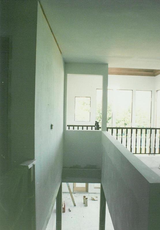 Looking from the entrance of the house over the new stairwell, out into the new 