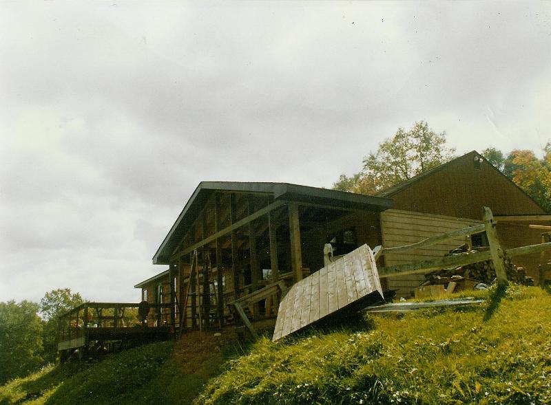 Looking up from below during construction. The old, small deck is in the foregro
