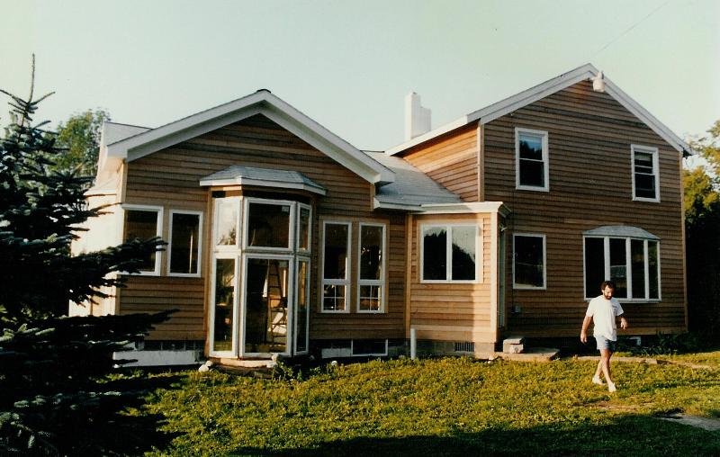 The owner walking away from the house and addition. He so appreciated the cedar 