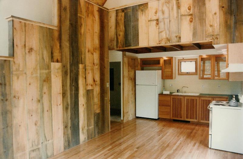 Looking from the Living Room toward the back door. The stepped wall to the left 