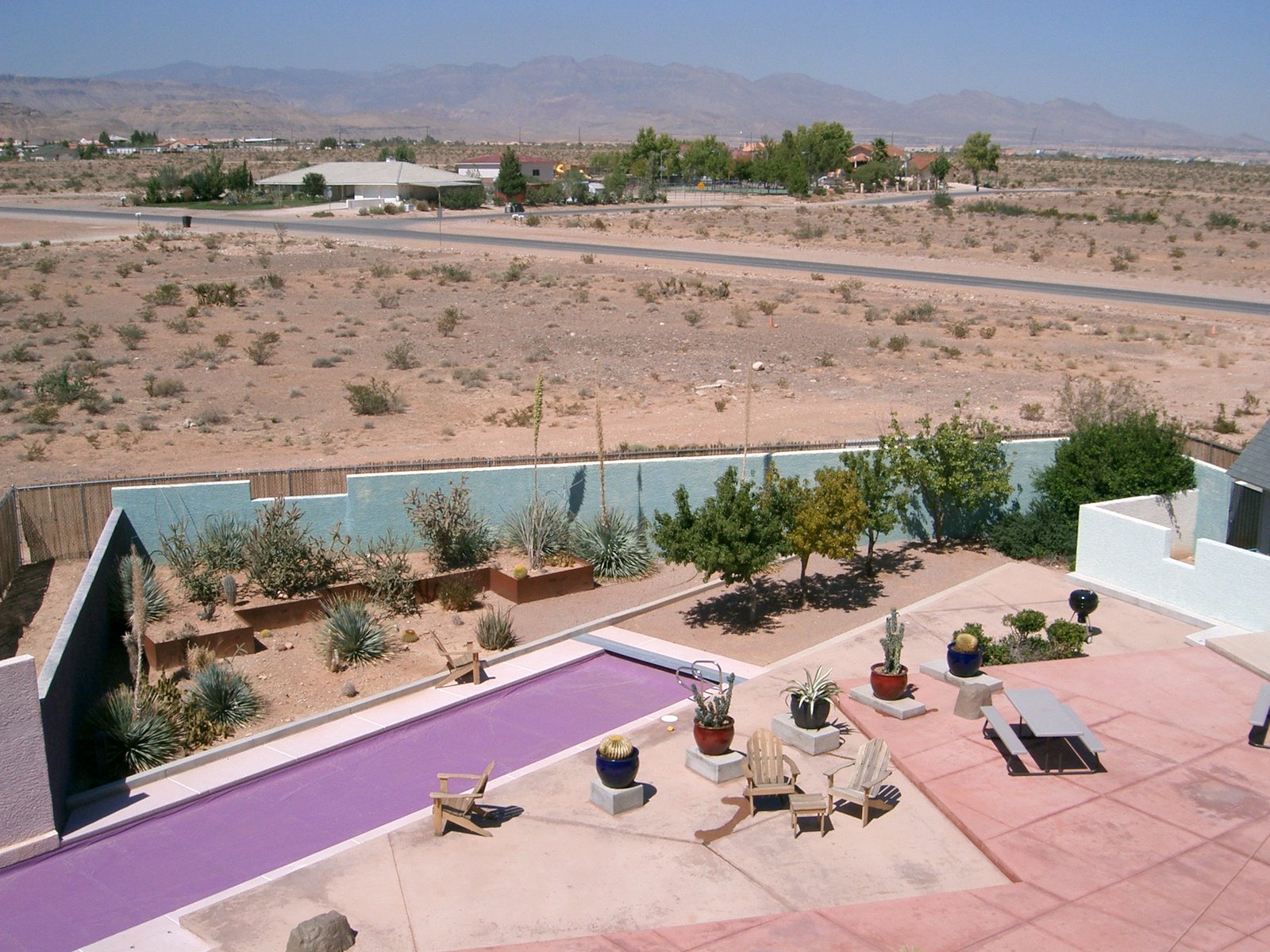 Looking down from the terrace over the Master Bedroom, to the courtyard below. T