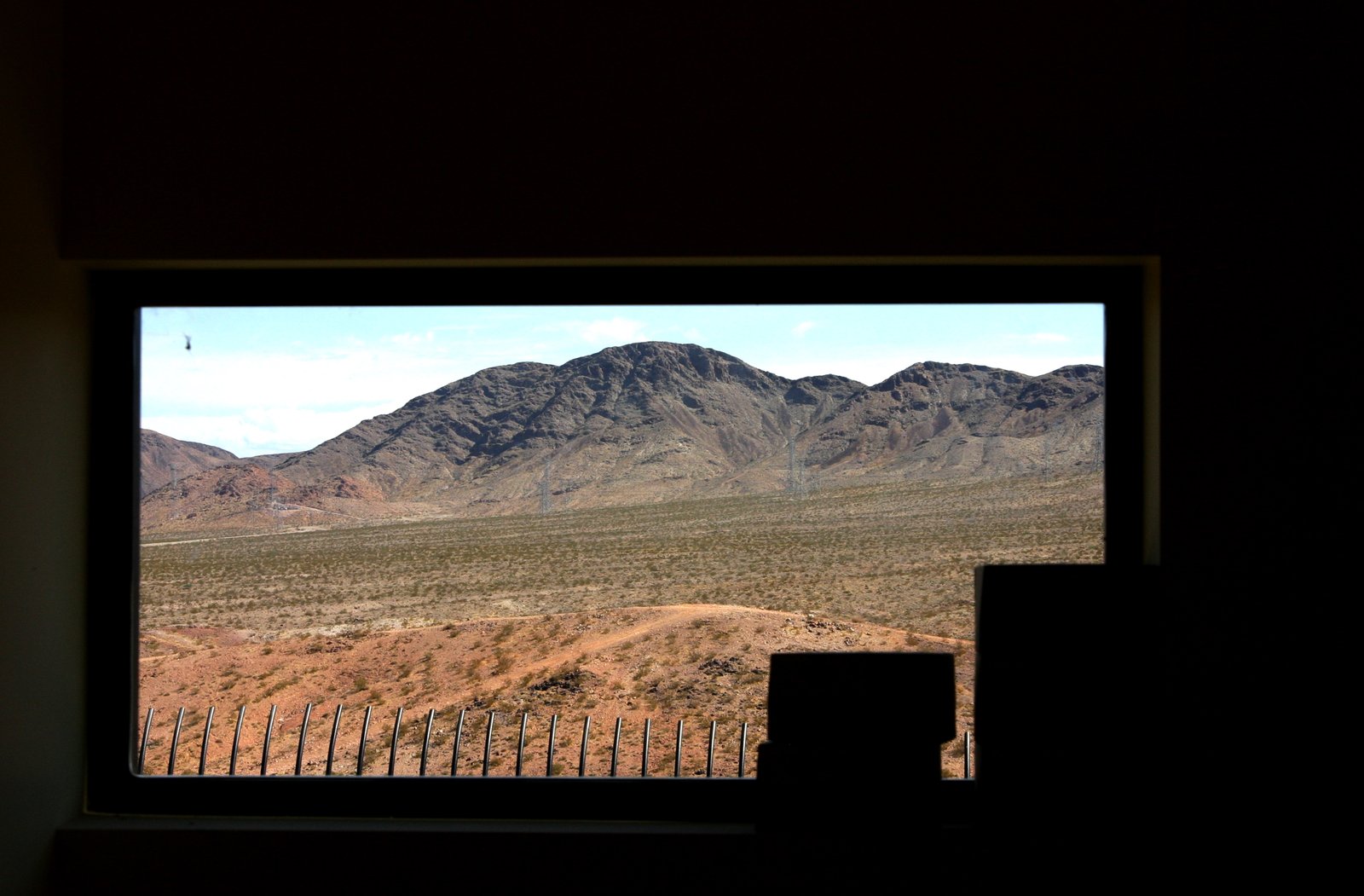 Looking out the window of a car pulling into the single car garage at the top. T