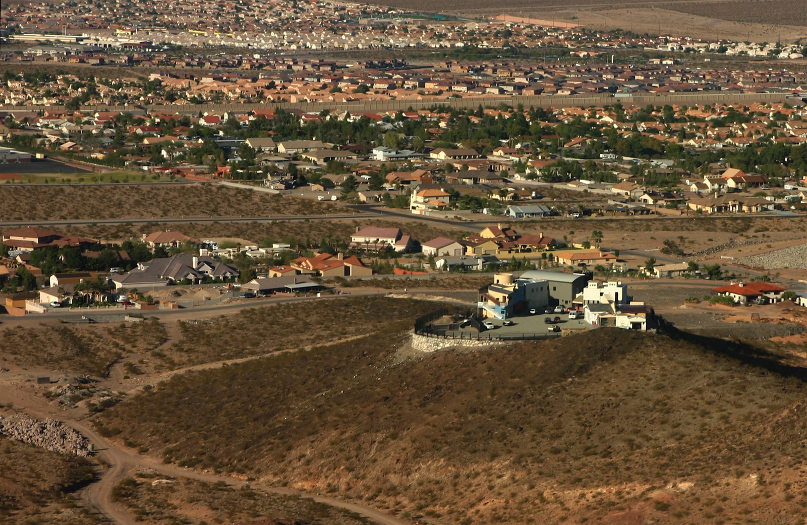 Looking from the south west over the Castle on its hill. The development beyond 
