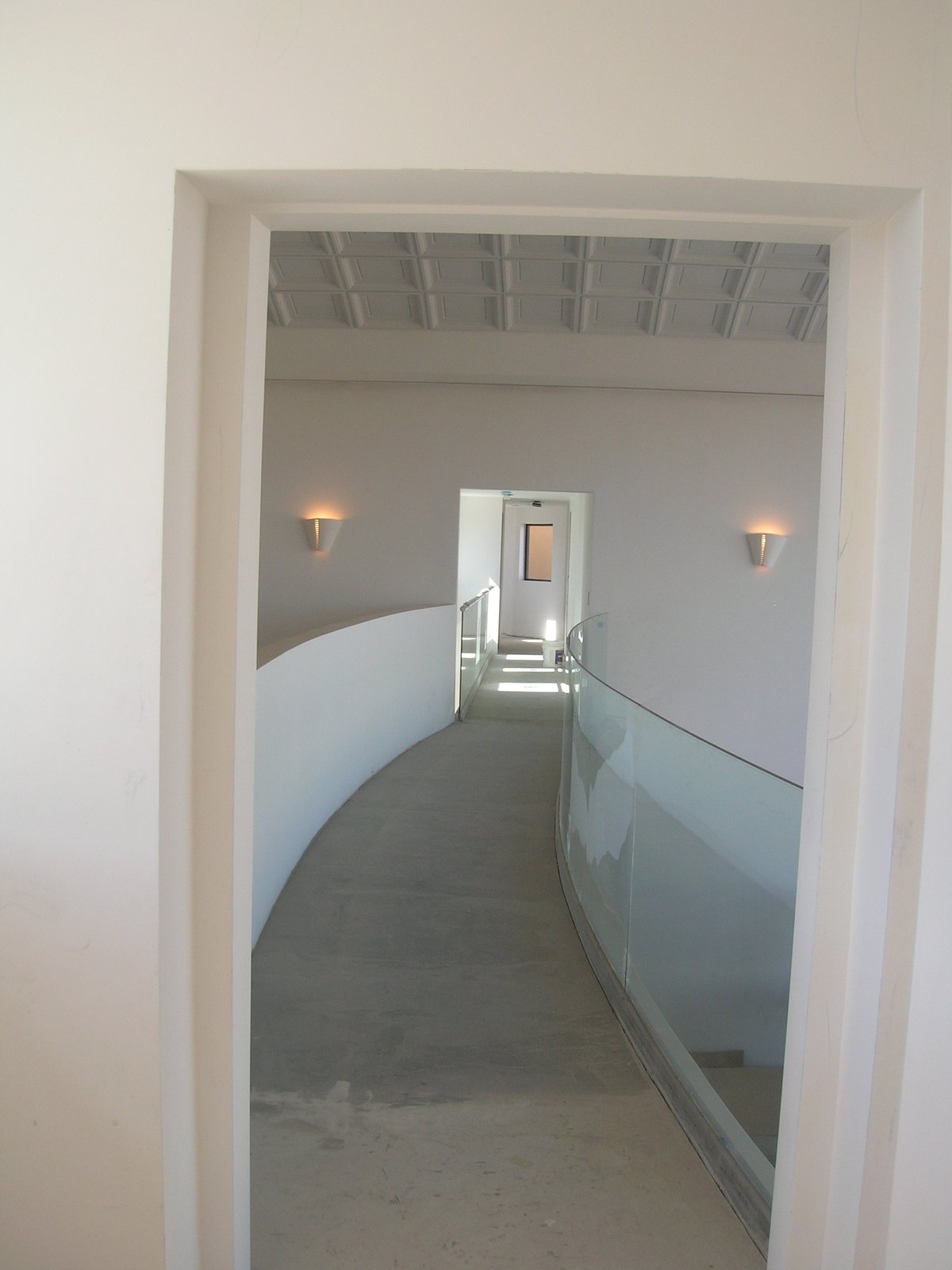 The curved, glass-railed bridge over the Reception Hall.
