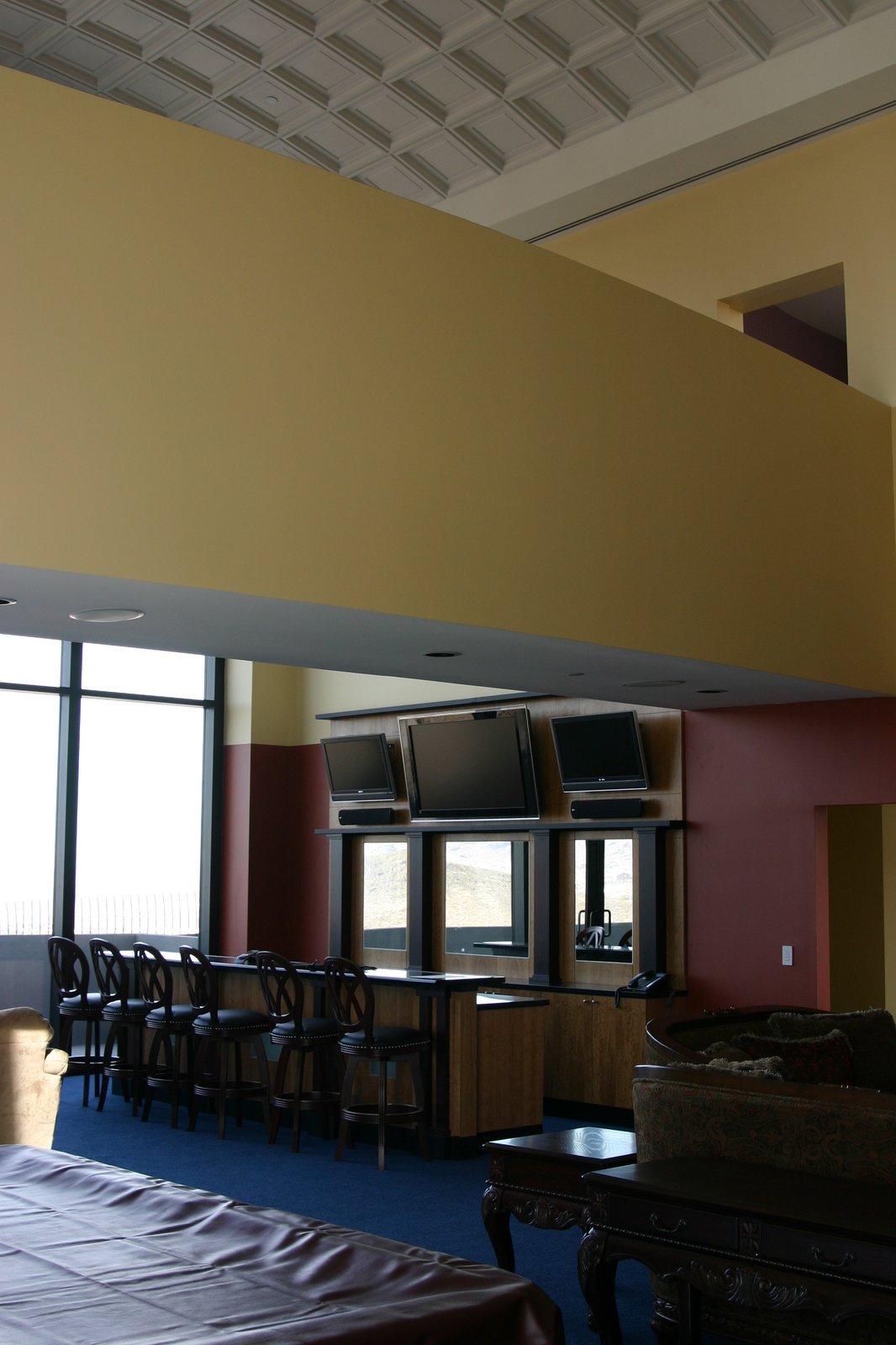 The Reception Hall, with the billiard table, bar and bridge overhead.