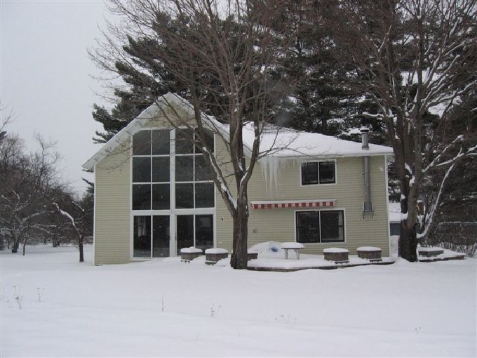 The house which we would be adding on to. The huge two story window faces Mount 