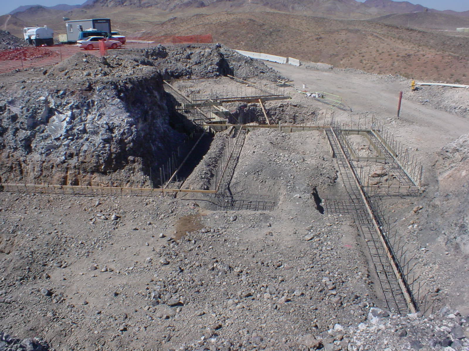 The compartive sizes of the new structure and the existing house is skewed in th