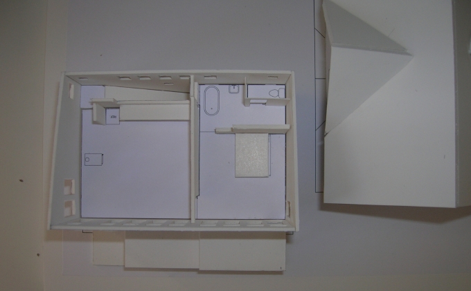 The sixteenth inch scale model with the roof removed. The Bedroom is to the righ