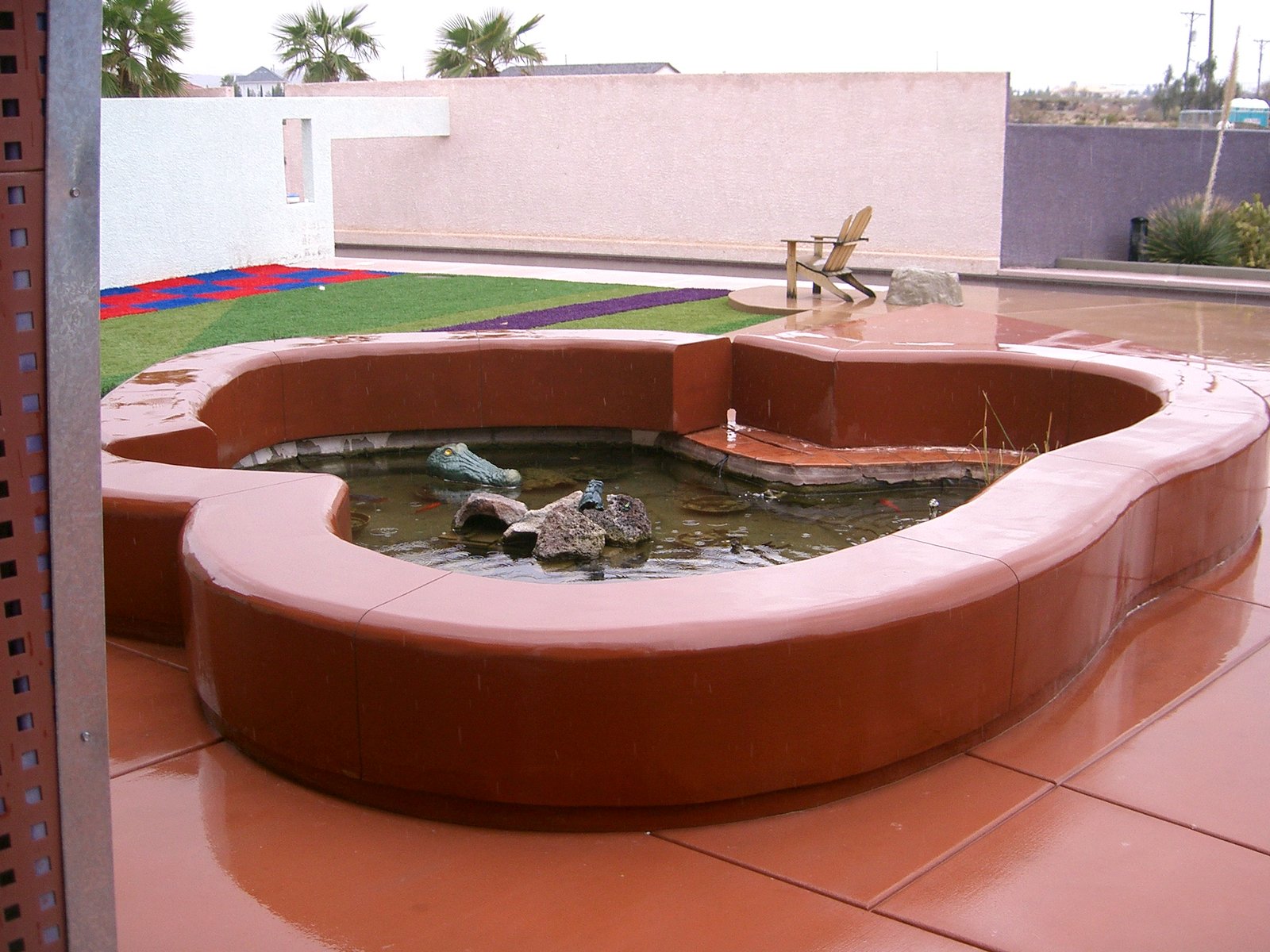 The new concrete bench around the Koi pond.