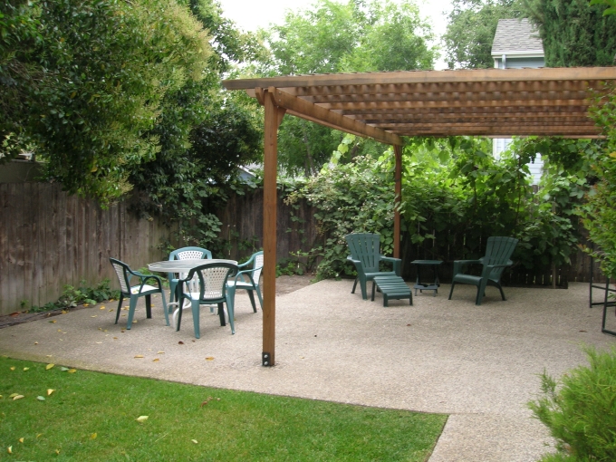 Exterior view into the corner of the backyard where the hot tub was proposed and