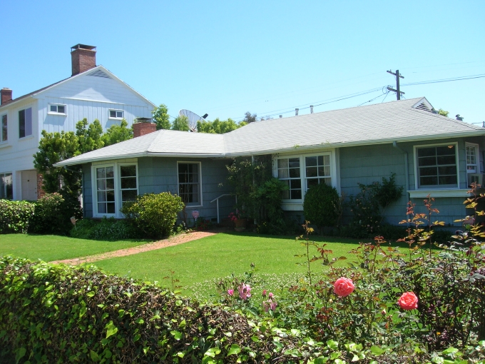 The front of the house from the street, before the work began.