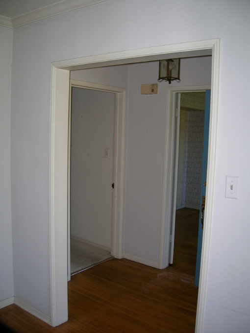 Looking from the Living Room into the Entry, toward the Dining Room.