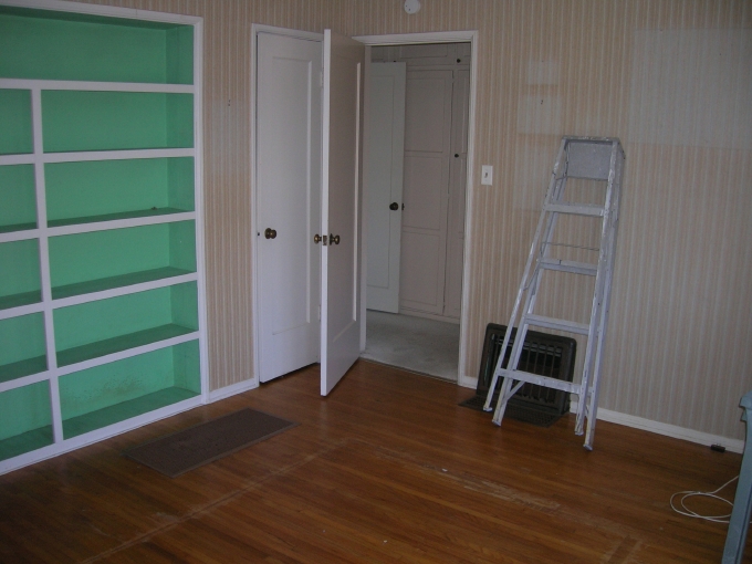 The Family Room, looking out into the hallway. Drawing the plan of the house we 